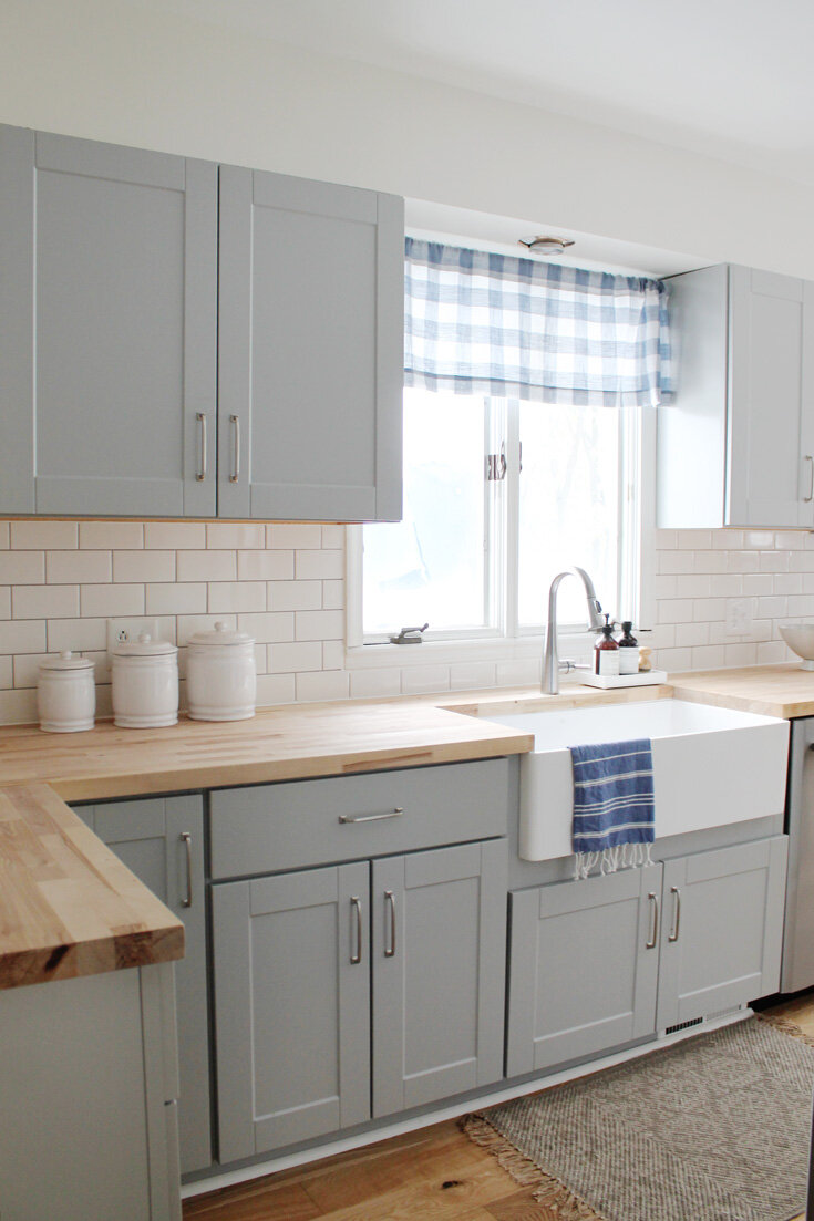 small kitchen remodel reveal with passive sw painted cabinets