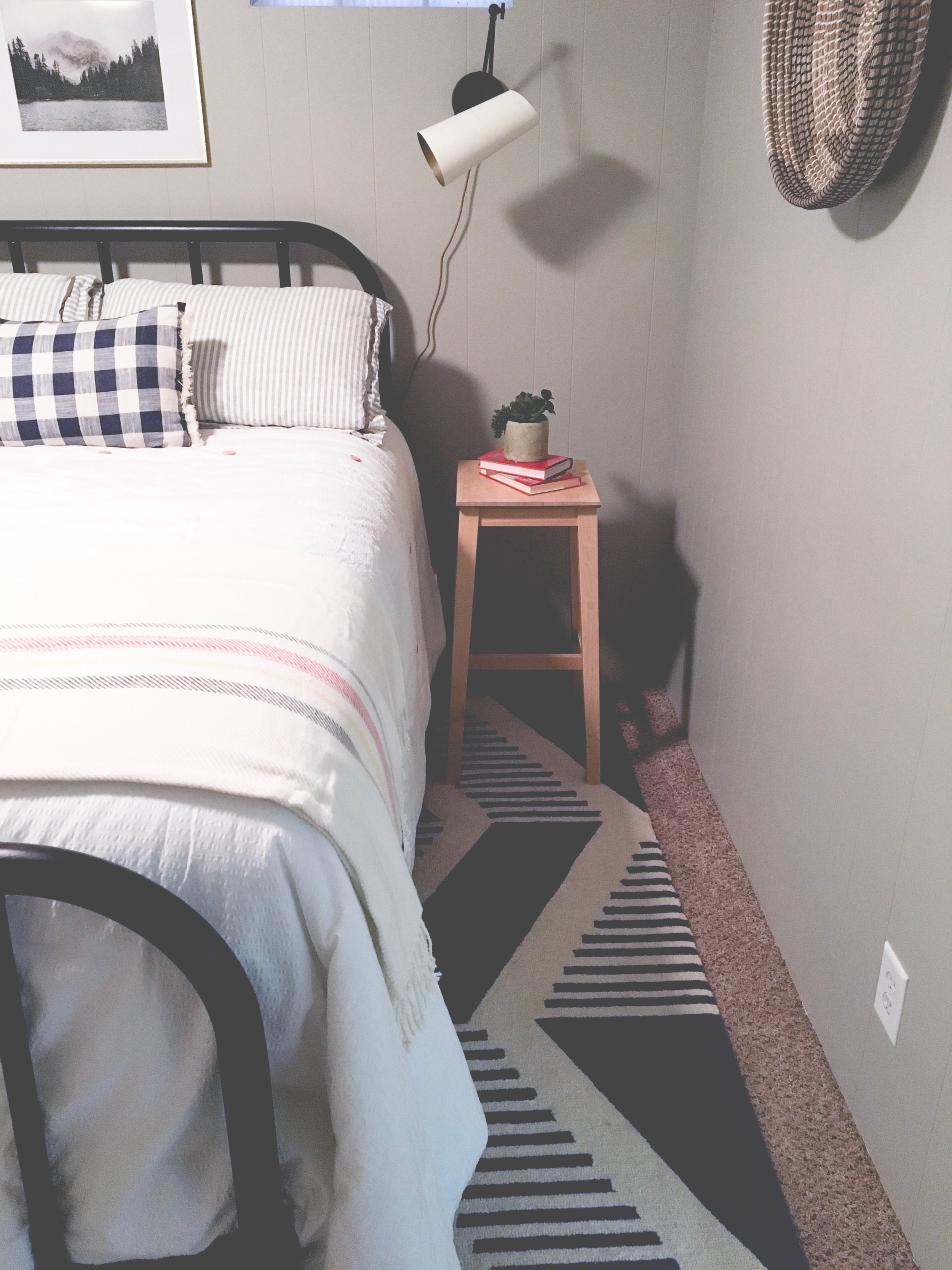 Our boring guest room gets a whole new modern cozy chic cabin look! Learn how to redecorate your guest room so it feels cozy and welcoming.